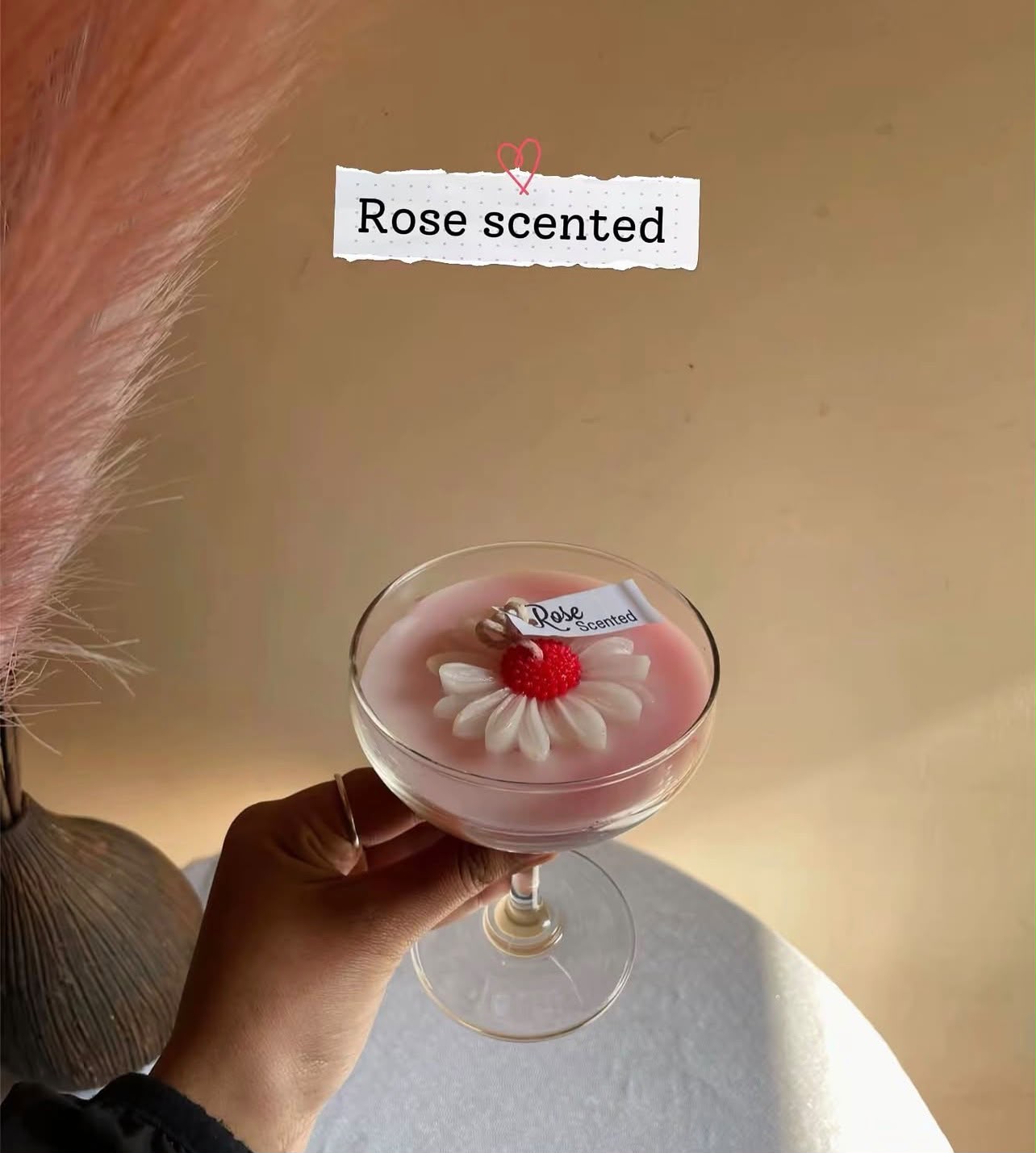 Blush Rose Bloom Candle 🌹🕯️ A luxurious rose-scented candle in a stylish glass vessel, decorated with a delicate floral bloom to bring warmth, elegance, and a romantic touch to any space. 🌸✨