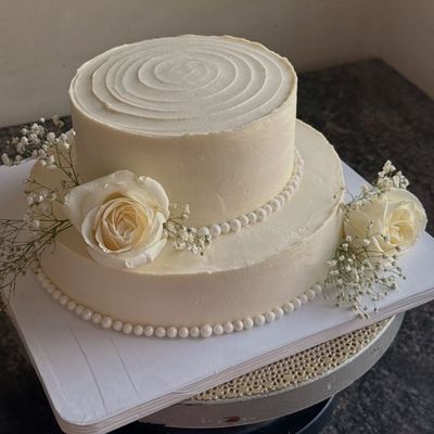 Elegant Two-Tier White Rose Celebration Cake