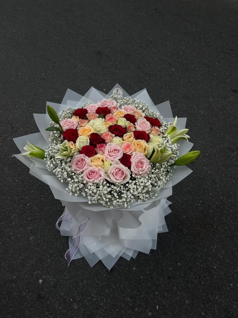 The Grand Symphony – 50 Premium Mixed Roses & 5 stem Lily Luxury Bouquet