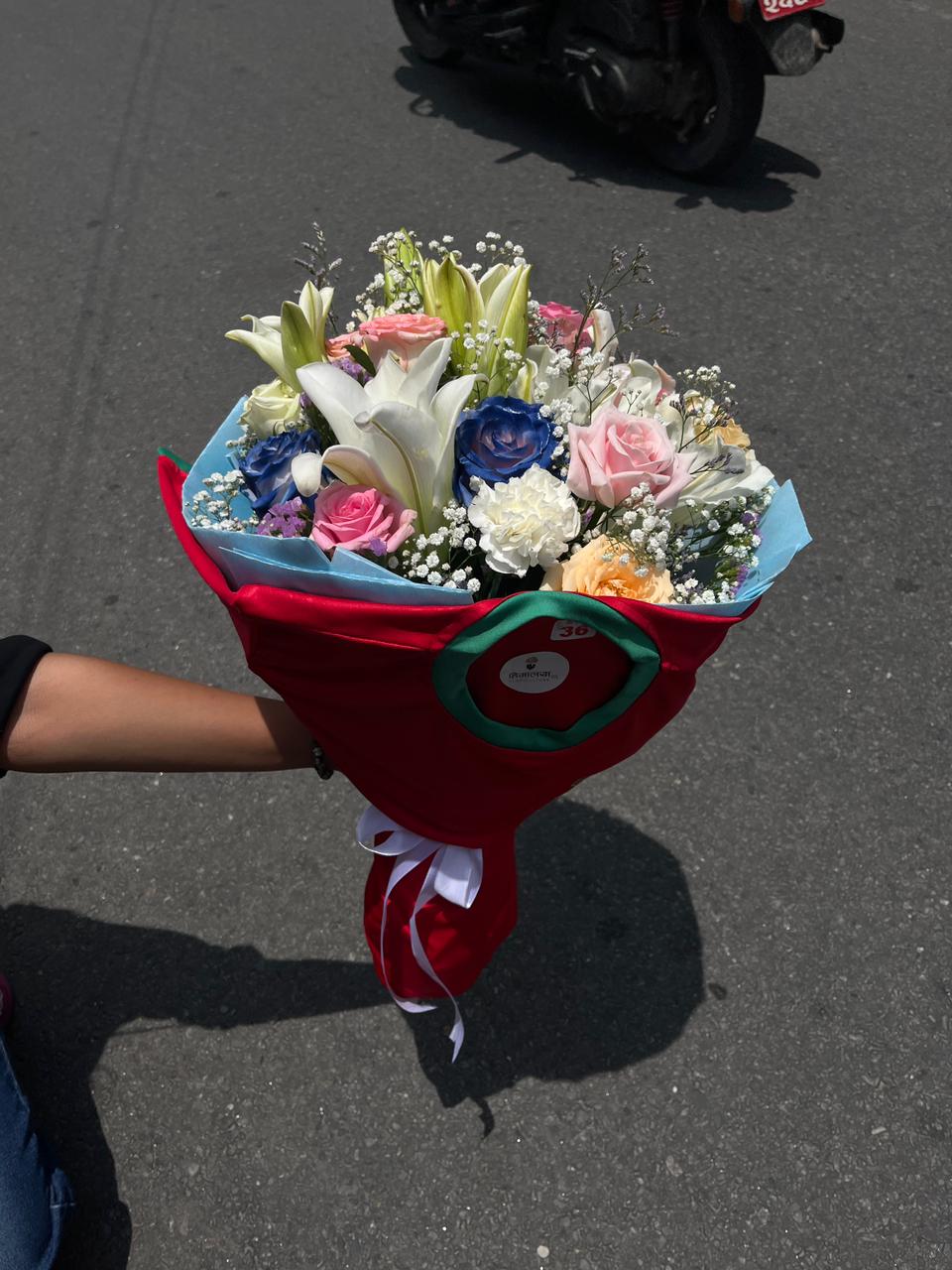 Combine football passion and floral elegance with our premium Portugal Jersey, lily, and mixed flower bouquet. Perfect for match days and true fans. Shop now!