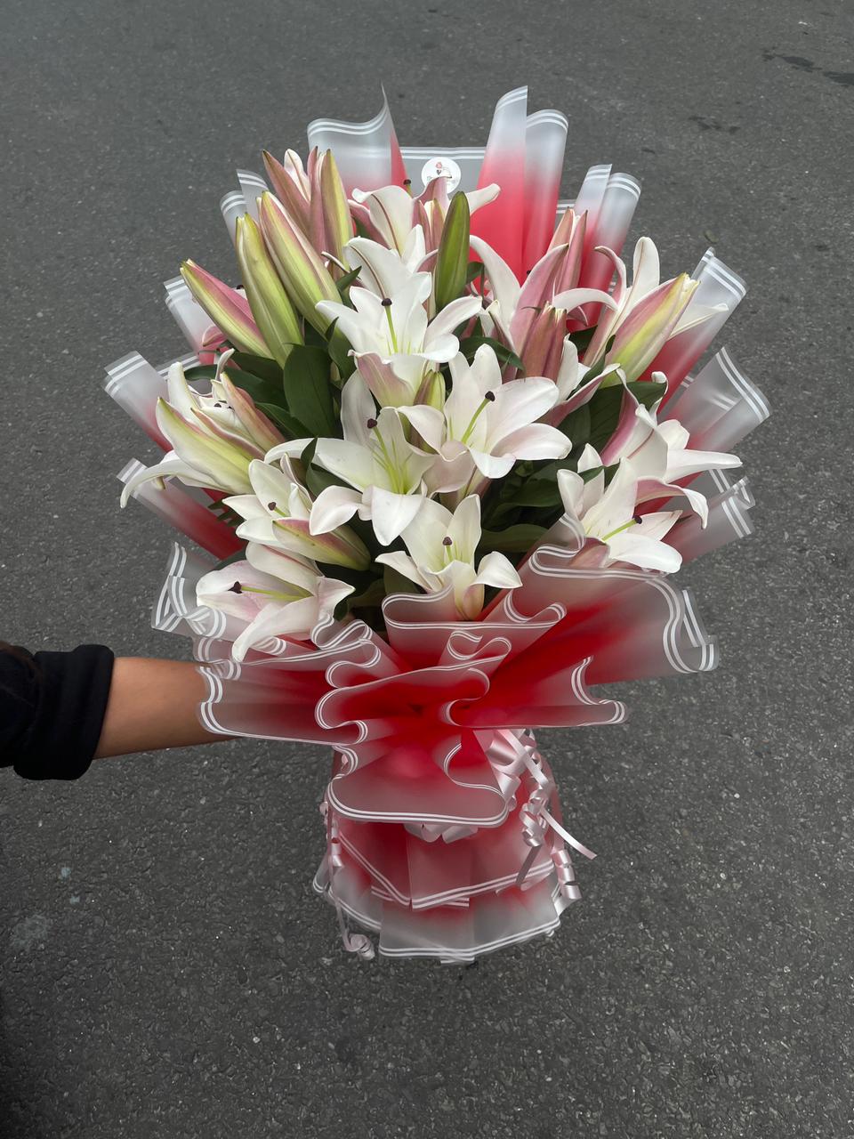 Experience the luxury of 10 premium, fragrant long-stemmed lilies. Hand-tied, beautifully wrapped, and delivered fresh to bloom beautifully at home. Shop now!