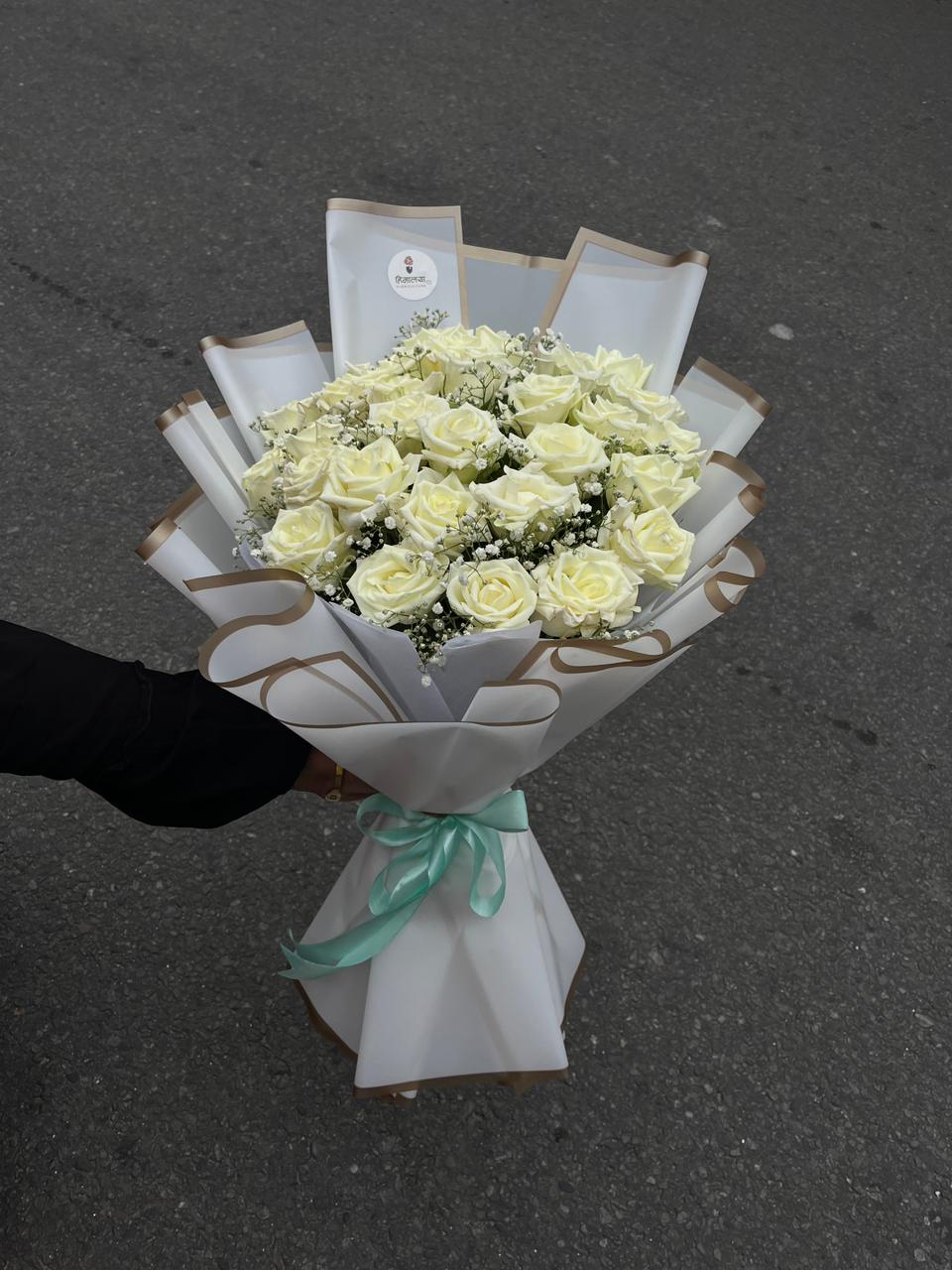 Includes premium flower food packets and clear care instructions to keep the pristine petals vibrant.