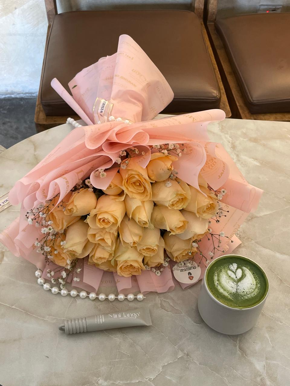 Indulge them with our luxury 33-stem premium peach rose bouquet. Wrapped in elegant, modern packaging for the ultimate minimalist chic gift. Order fresh today!