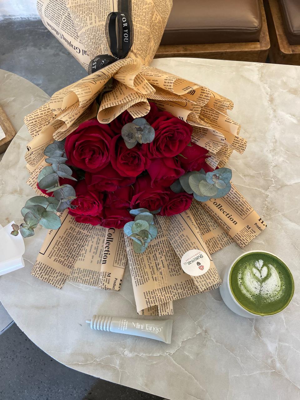 Elevate the classic red rose with fresh eucalyptus foliage. Our handcrafted 20-stem premium bouquet delivers modern elegance and romance. Order fresh today!