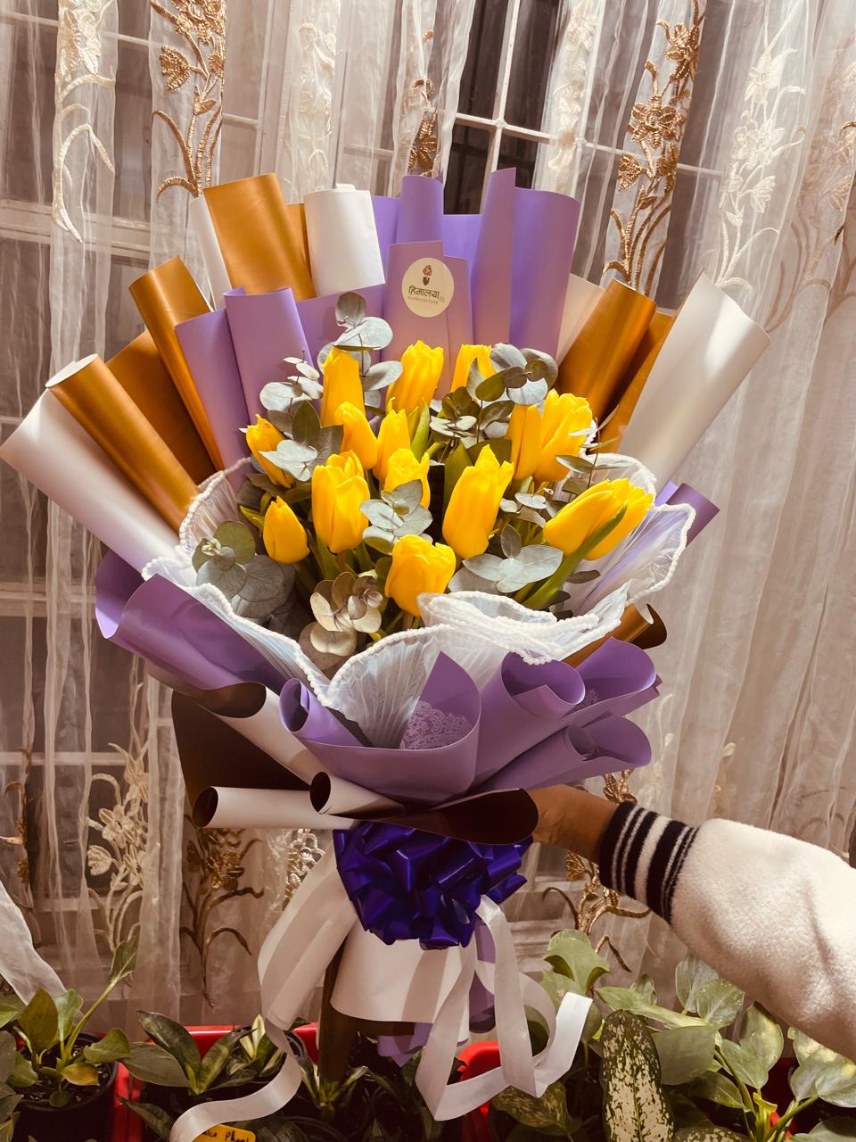 Delight them with 15 premium Dutch tulips wrapped in luxury, modern layered packaging. The perfect minimalist floral gift. Order fresh today!