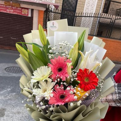The Radiant Lily & Gerbera Seasonal Arrangement