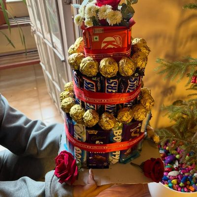 Himalaya Luxury Chocolate Tower & Red Roses Arrangement