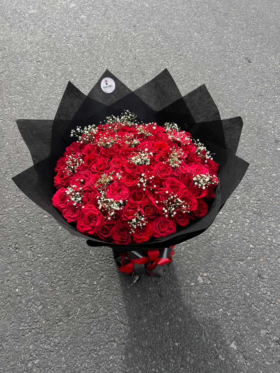 As flowers are natural products, the size, color, and bloom stage of each rose may vary slightly from the images displayed. If any flowers or wrapping materials are unavailable due to seasonal conditions, they will be replaced with similar items of equal or greater value while maintaining the bouquet's overall appearance and quality. To enjoy maximum freshness, keep the bouquet in clean water and away from direct sunlight and heat.