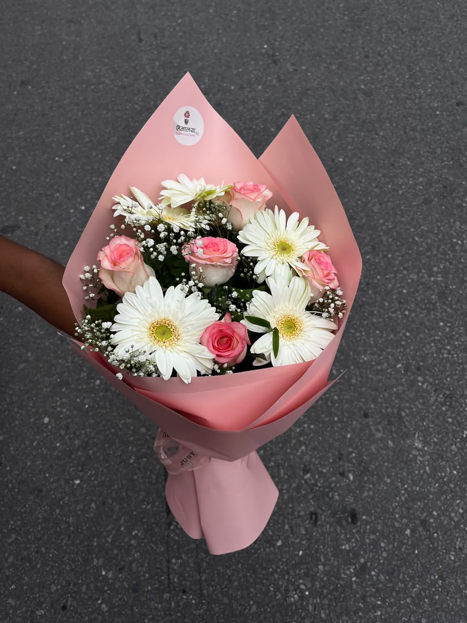 Flowers are natural products, so the size, color, and bloom stage may vary slightly from the images shown. If any flowers, fillers, or wrapping materials are unavailable due to seasonal availability, they will be substituted with similar items of equal or greater value while preserving the bouquet's overall style and quality. To keep your bouquet fresh for longer, place the stems in clean water and keep them away from direct sunlight and excessive heat.