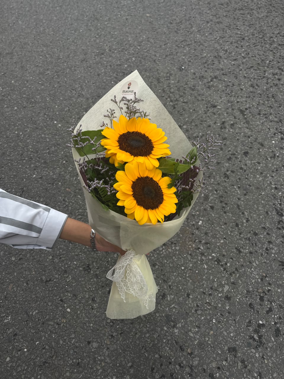 Each bouquet is handcrafted using fresh flowers. As flowers are seasonal, slight variations in bloom size, color, and filler flowers may occur while maintaining the bouquet's overall style and quality. To keep your bouquet looking fresh for longer, trim the stems, place them in clean water, and change the water every 2–3 days.