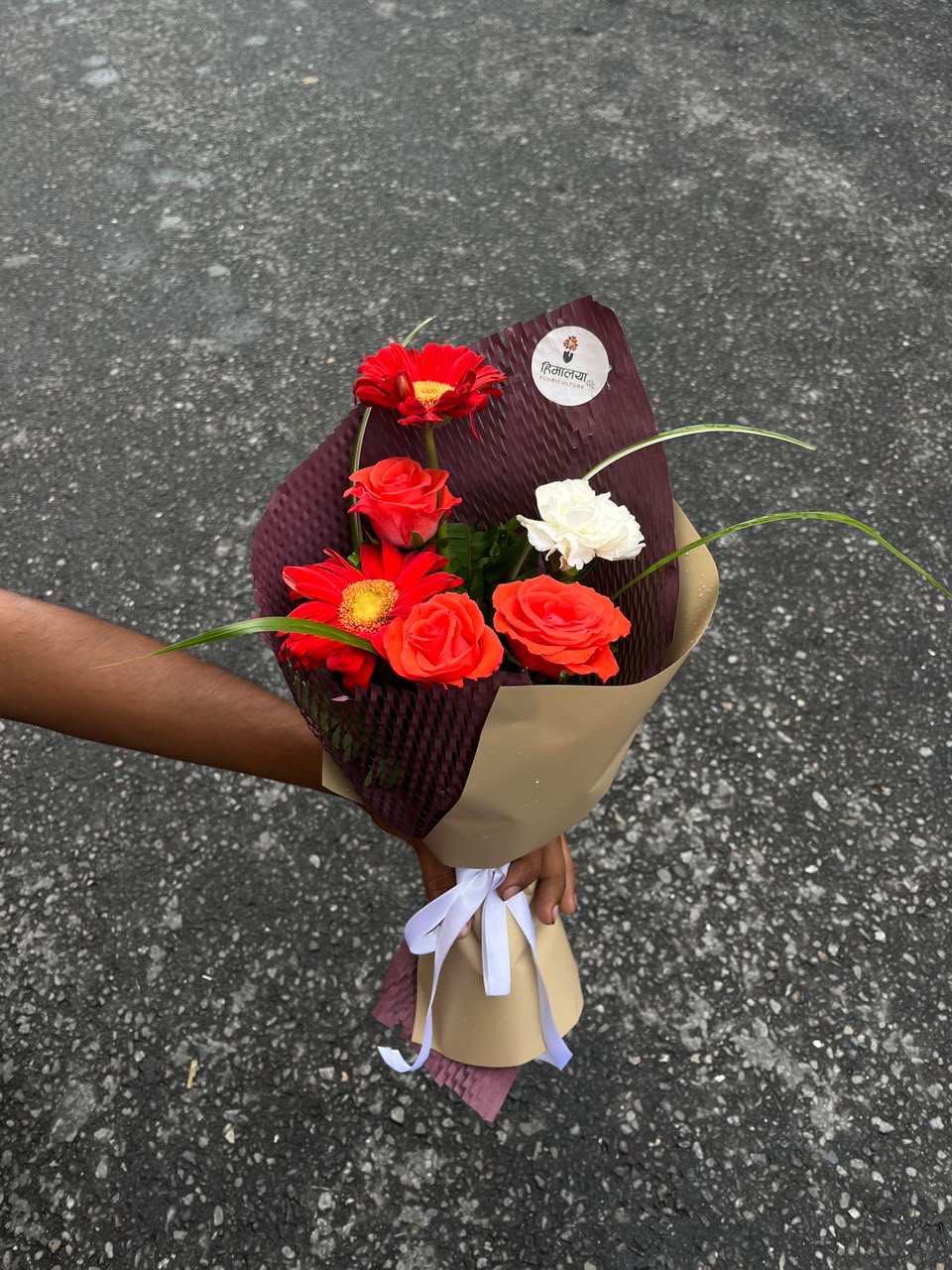 Each bouquet is handcrafted using fresh flowers, making every arrangement unique. Flower shades, wrapping, and filler flowers may vary slightly depending on seasonal availability while maintaining the overall design and color theme. To keep your bouquet fresh for longer, trim the stems at an angle, place the flowers in clean water, change the water every 1–2 days, and keep the arrangement away from direct sunlight, heat, and drafts.