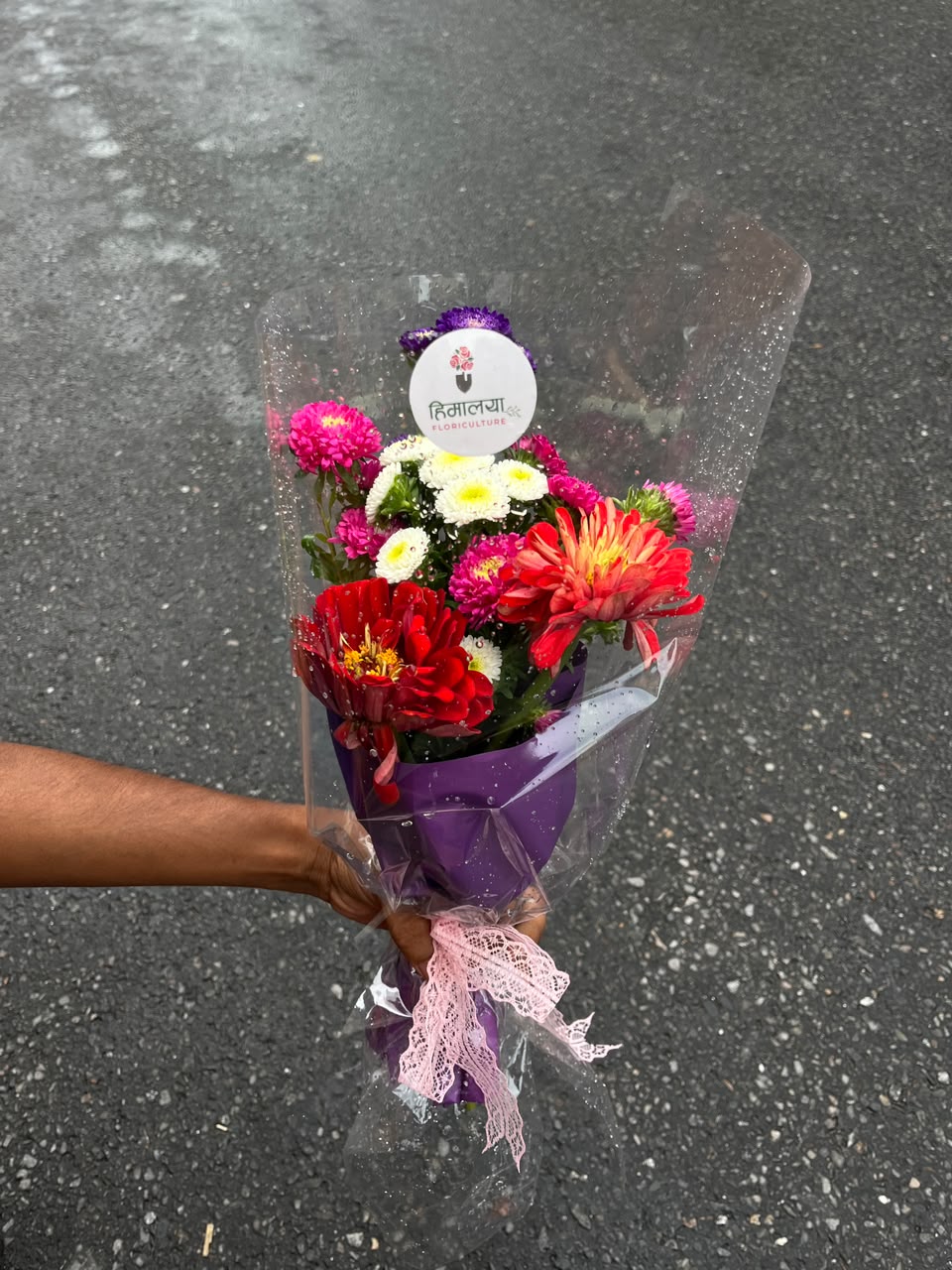 Flower colors and varieties may vary slightly depending on seasonal availability while maintaining the overall beauty and quality of the bouquet. Keep flowers in fresh water and away from direct sunlight to enjoy longer-lasting freshness.
