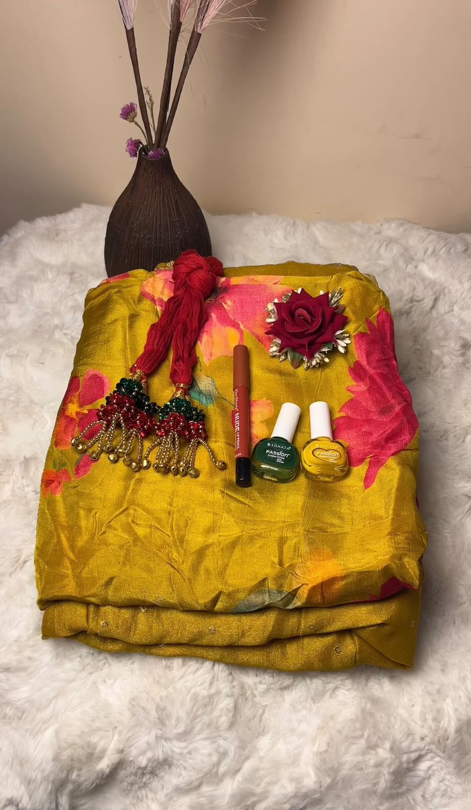 Each Shrawan Combo is carefully curated with festive essentials to complement your traditional celebrations. The color or design of the umbrella kurtha, lipstick shade, rose clutcher, and other accessories may vary slightly based on availability while maintaining the overall festive theme and quality. Please refer to the size chart before ordering the kurtha to ensure the best fit. This combo is perfect for Shrawan, Teej, festive gatherings, and gifting to your loved ones.