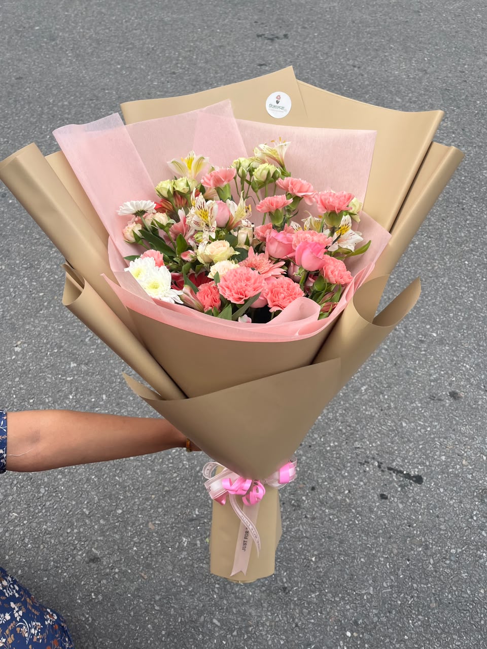 Flower colors, varieties, and arrangement style may vary slightly depending on seasonal availability while maintaining the overall beauty and quality of the bouquet. Keep flowers in fresh water and away from direct sunlight to extend the freshness of the blooms.