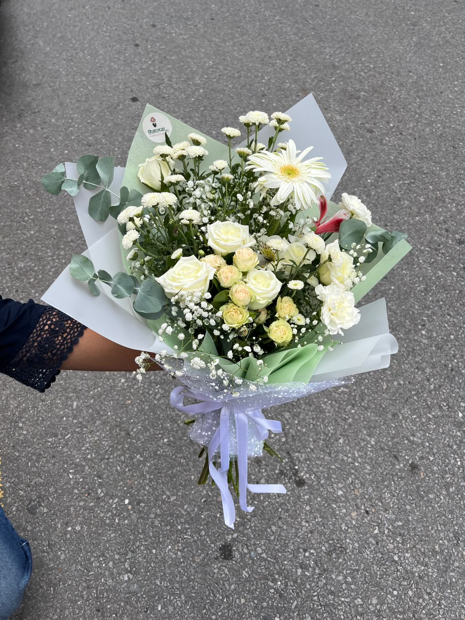 Flower varieties, colors, and arrangement style may vary slightly depending on seasonal availability while maintaining the overall beauty and quality of the bouquet. Keep flowers in fresh water and away from direct sunlight to enjoy longer-lasting freshness.