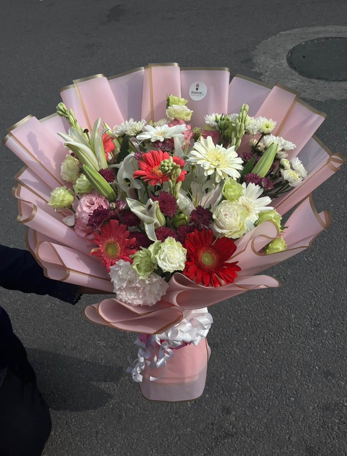 This premium bouquet is arranged with care to ensure a beautiful presentation. Please note that flower varieties, colors, and wrapping style may vary slightly depending on seasonal availability while maintaining the same quality, freshness, and overall value.
