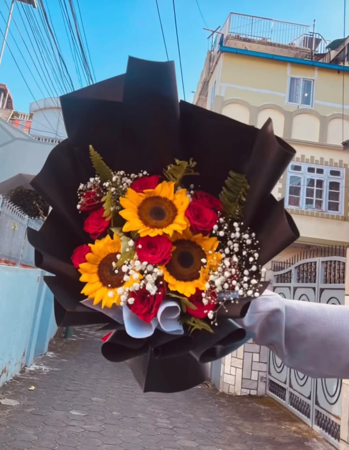 Flower bloom stages may vary depending on availability. In case any flower or material is unavailable, a suitable replacement of similar value and beauty may be used to maintain the overall look and quality of the bouquet.