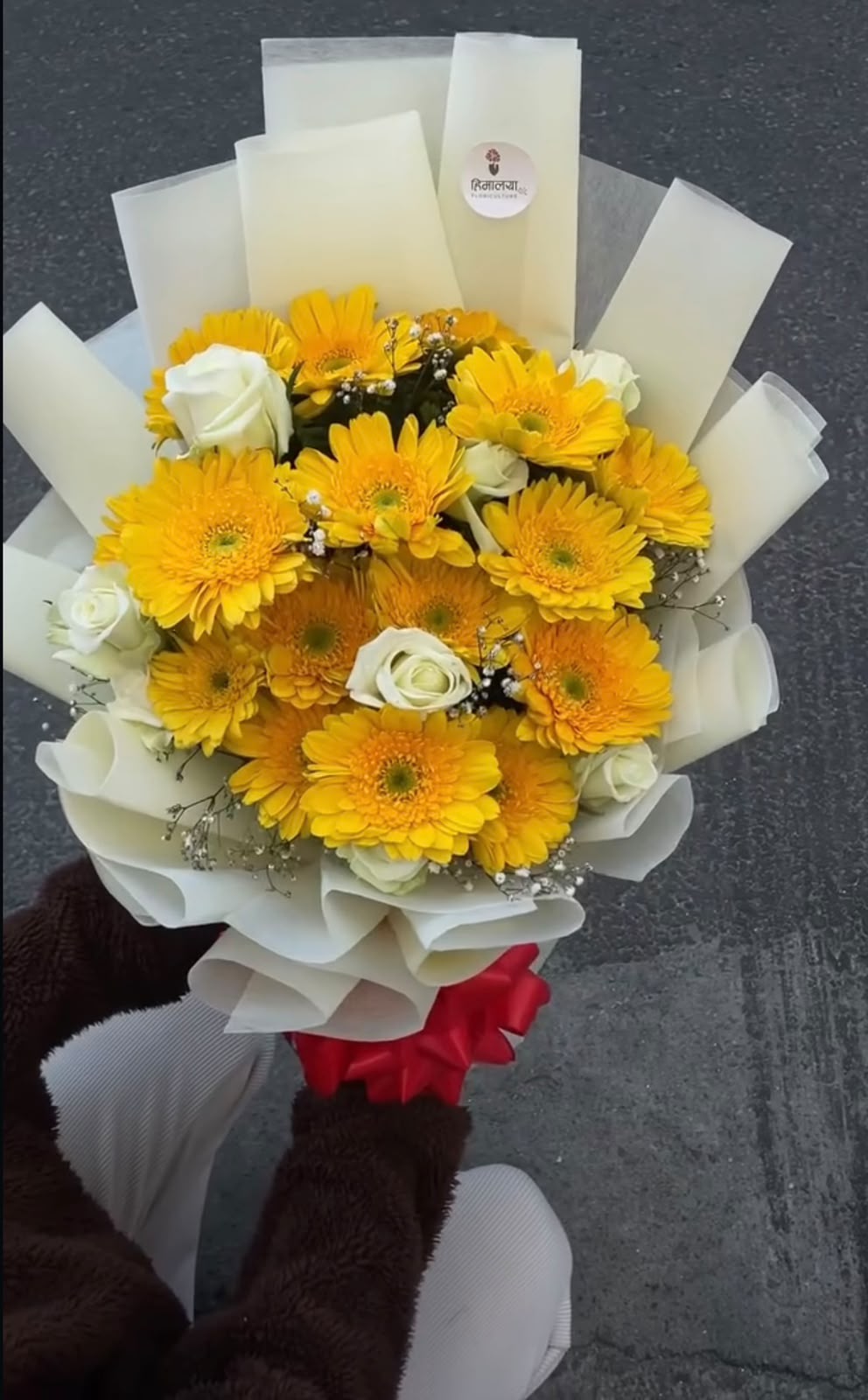 Flower colors and bloom stages may vary depending on availability. In case any flower or wrapping material is unavailable, a suitable replacement of similar value and style may be used to maintain the overall beauty and premium presentation of the bouquet.