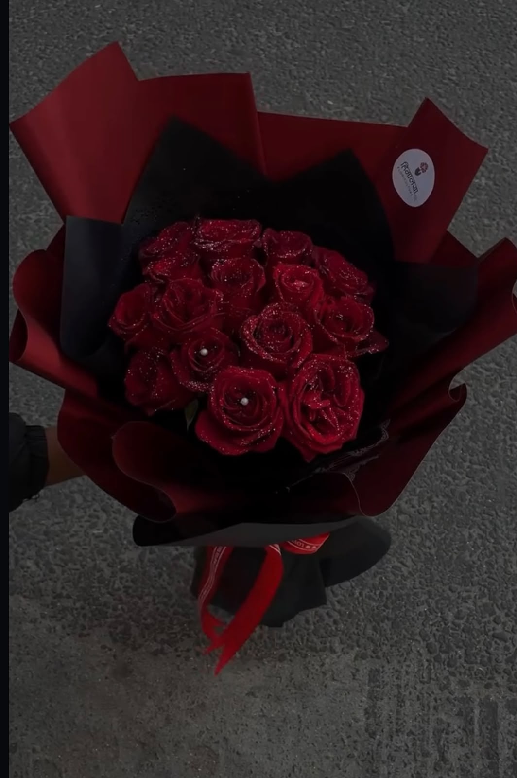 Flower appearance, glitter finish, and wrapping style may vary slightly depending on availability while maintaining the overall premium look and quality of the bouquet.