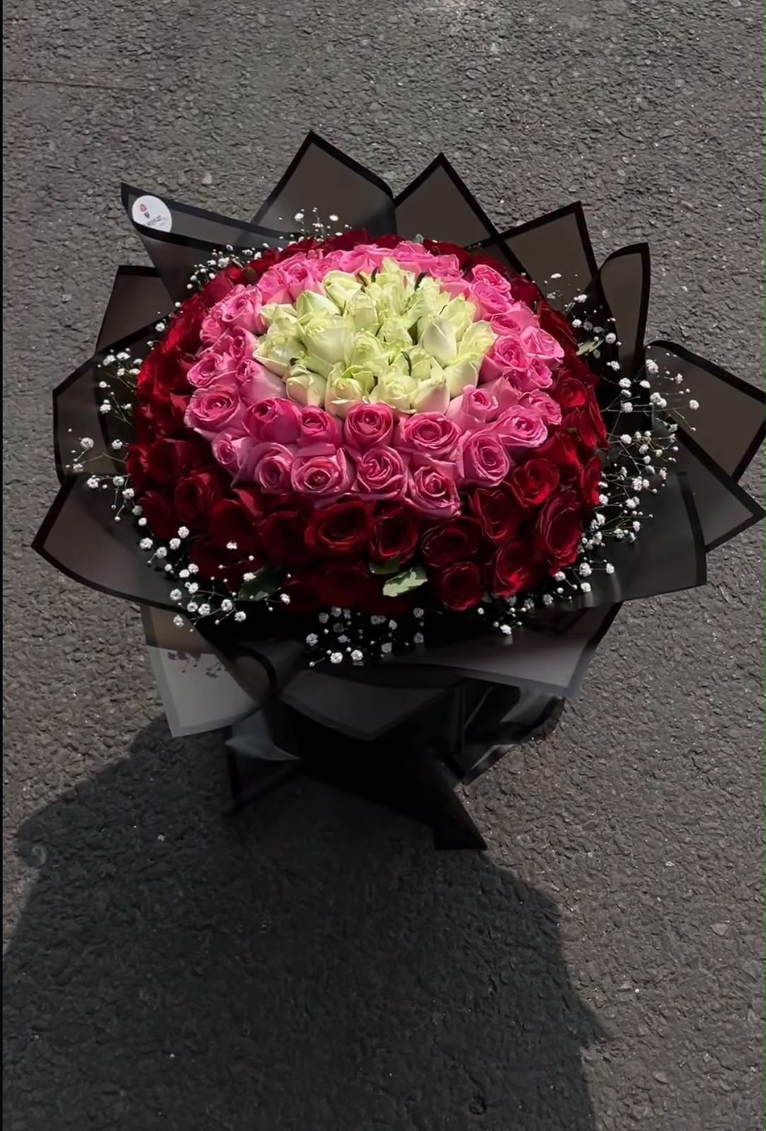 Rose colors and arrangement style may vary slightly depending on seasonal availability while maintaining the overall color theme, premium appearance, freshness, and quality of the bouquet.