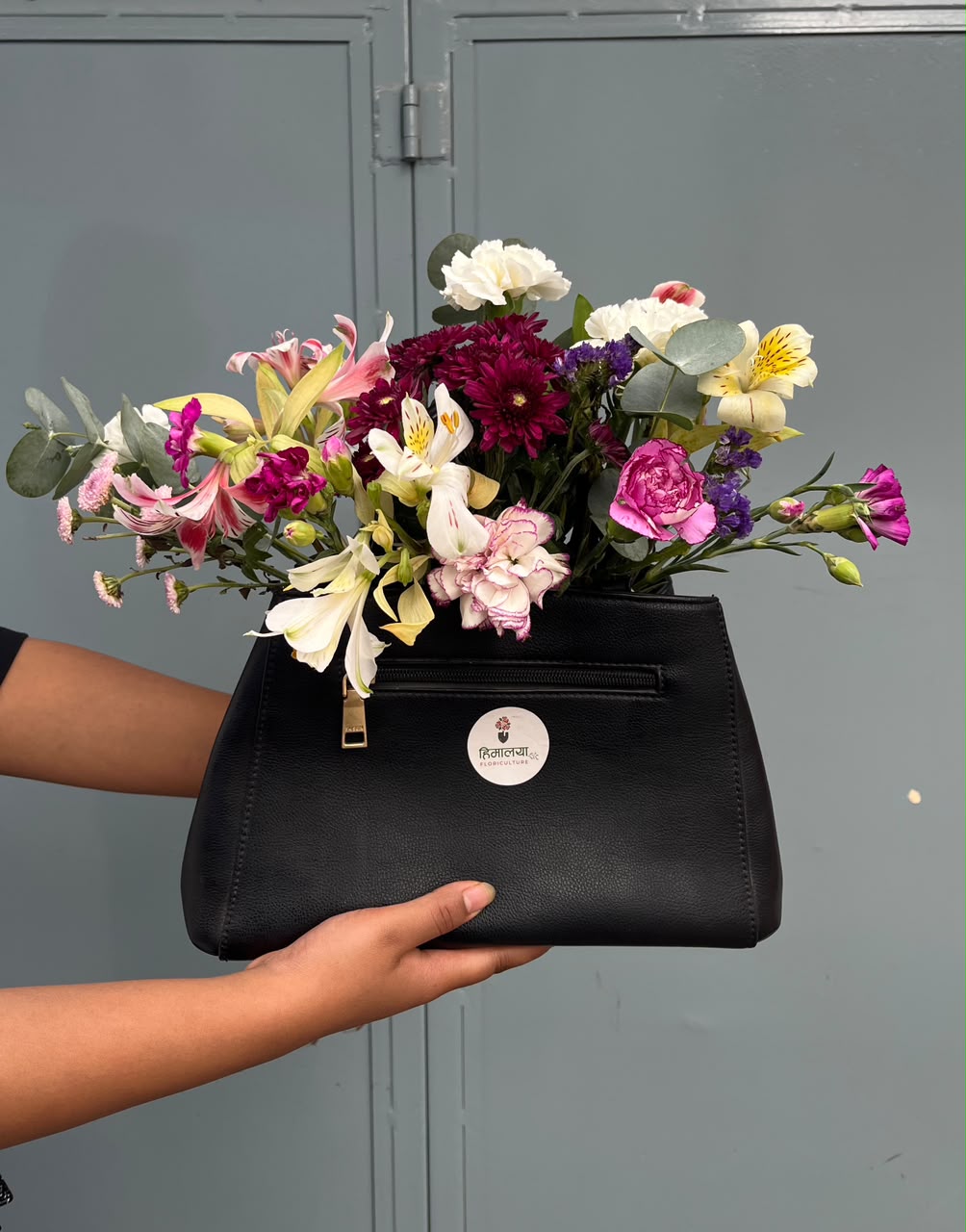 Flower varieties, colors, fillers, and arrangement style may vary depending on seasonal availability. Suitable flower substitutions will be made while maintaining the overall design, freshness, and premium quality of the arrangement.