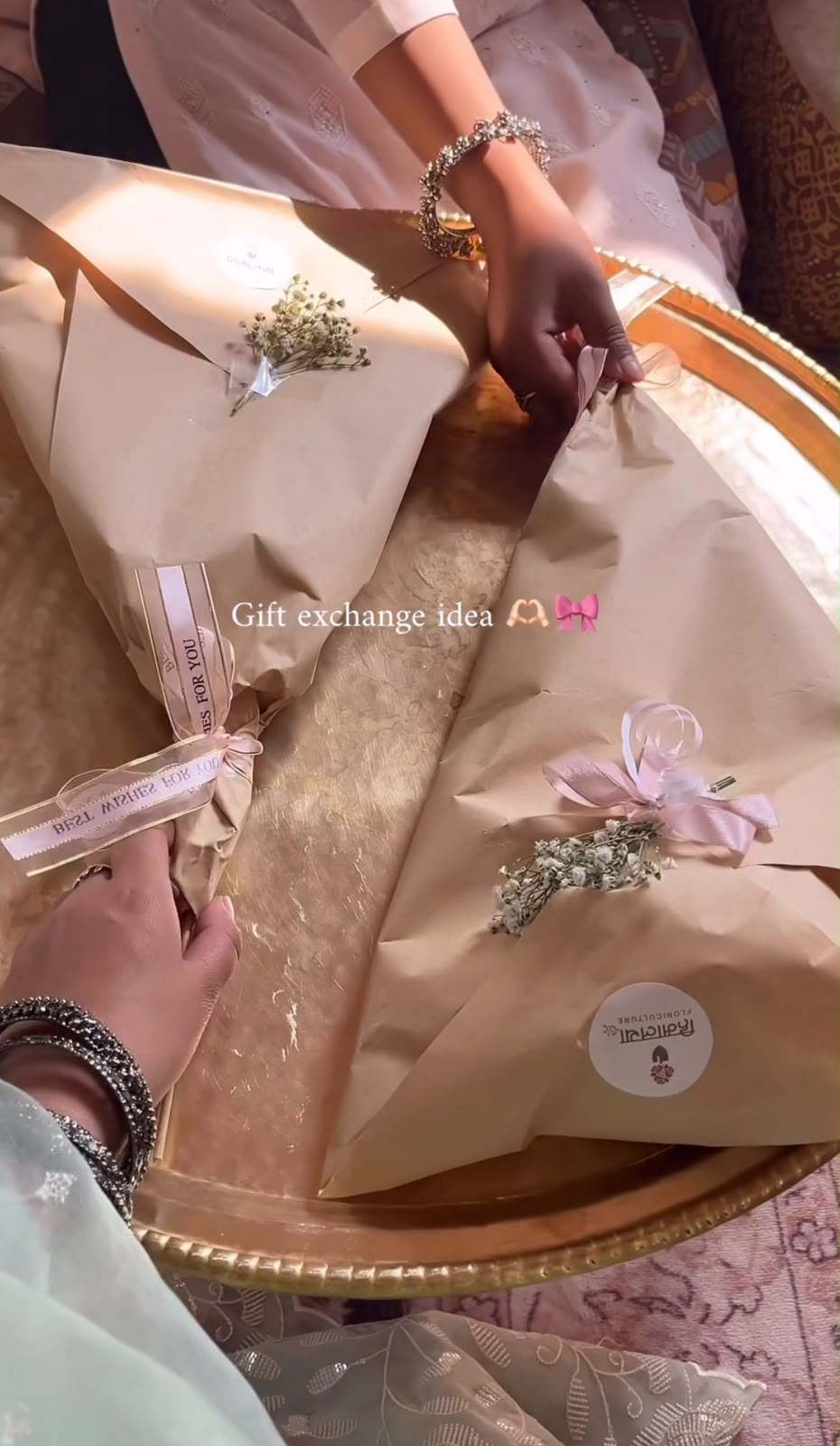 Flower colors and bloom stages may vary depending on availability. In case wrapping material is unavailable, a suitable replacement of similar value and style may be used to maintain the overall beauty and premium presentation of both bouquets.