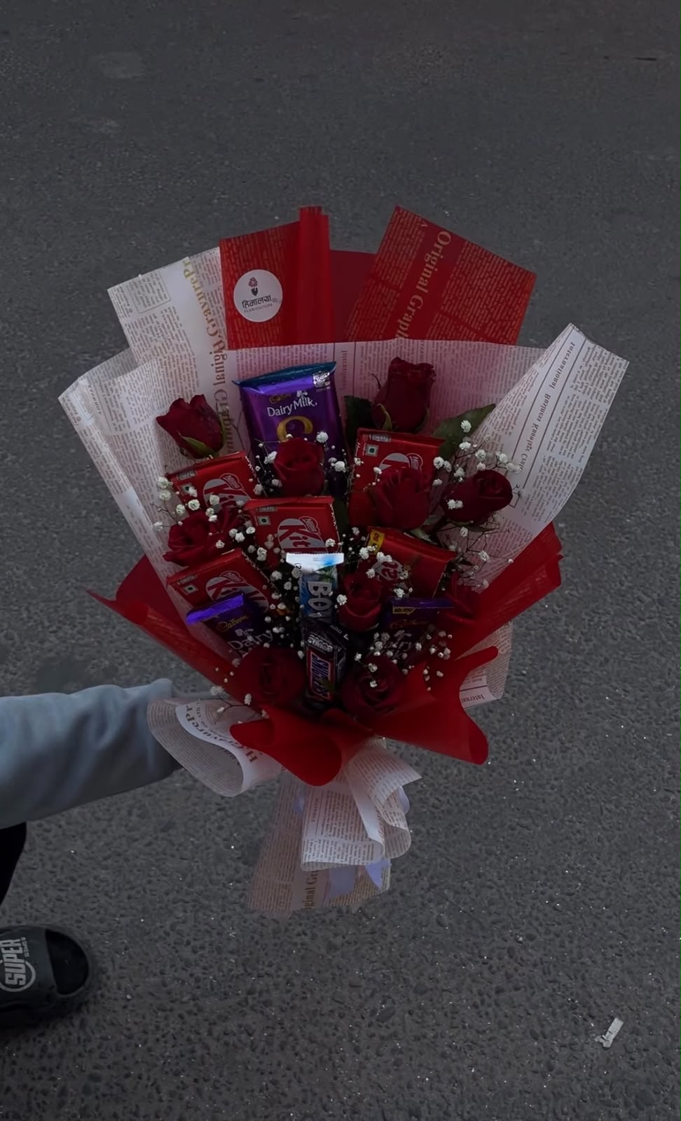Flowers and wrapping may vary slightly depending on seasonal availability while maintaining the overall design and quality. In the event that a particular chocolate is unavailable, it will be replaced with a similar chocolate of equal or greater value.