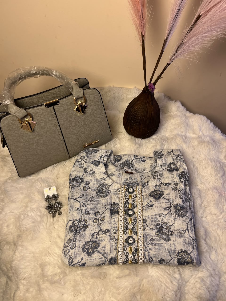 The design, color, size, and style of the kurtha, jhumka set, and handbag may vary depending on stock availability. Suitable replacements of equal or greater value will be provided while maintaining the overall quality, style, and presentation of the gift combo.