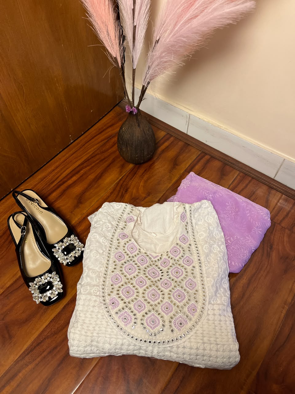The design, color, size, and style of the umbrella kurtha set and sandals may vary depending on stock availability. Suitable replacements of equal or greater value will be provided while maintaining the overall quality, elegance, and presentation of the gift combo.