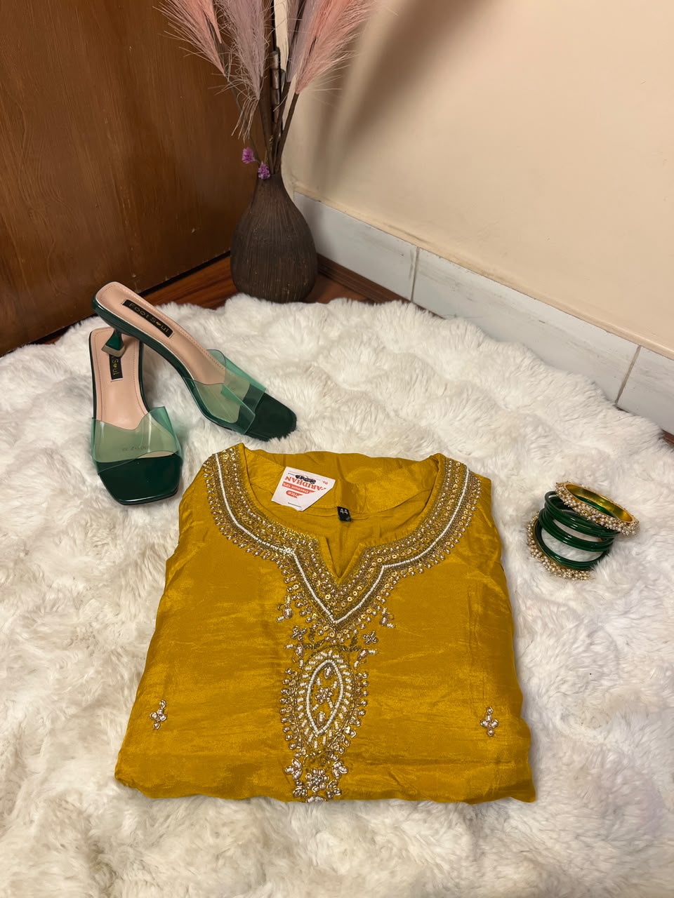 The design, color, size, and style of the kurtha set, chura, and sandals may vary depending on stock availability. Suitable replacements of equal or greater value will be provided while maintaining the overall quality, festive appeal, and presentation of the gift combo.